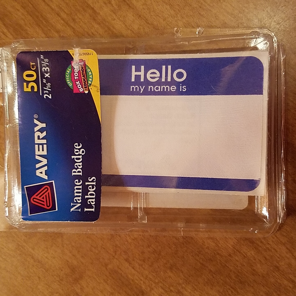 Twelve Avery name badge labels